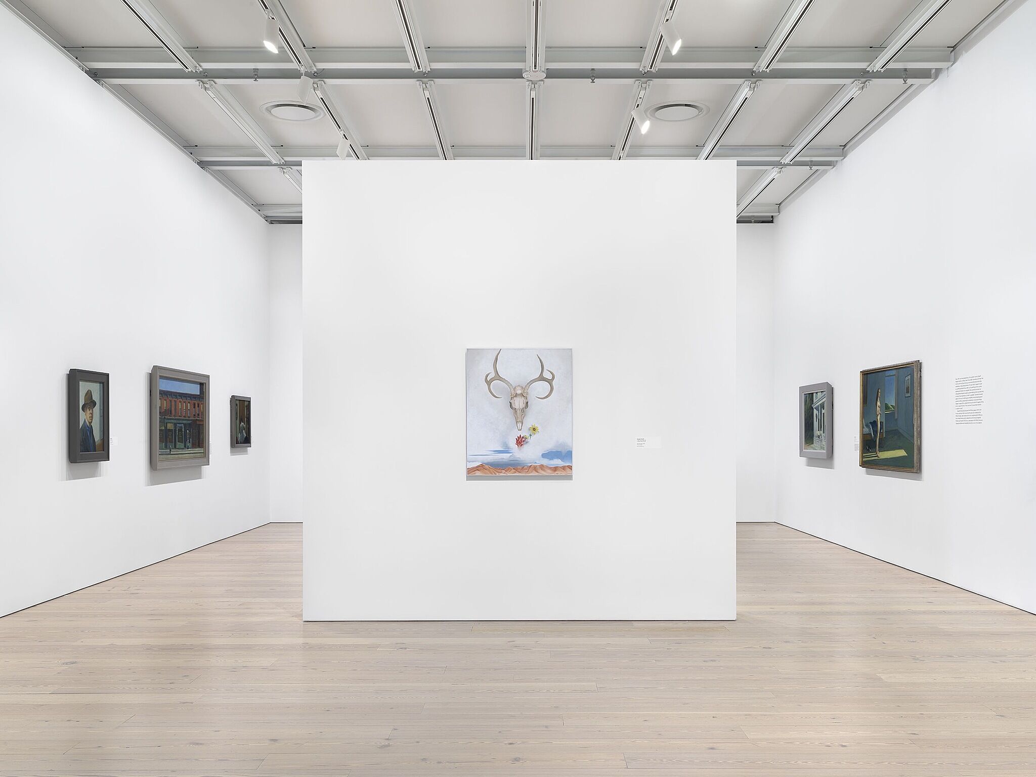 An image of the Whitney galleries with paintings