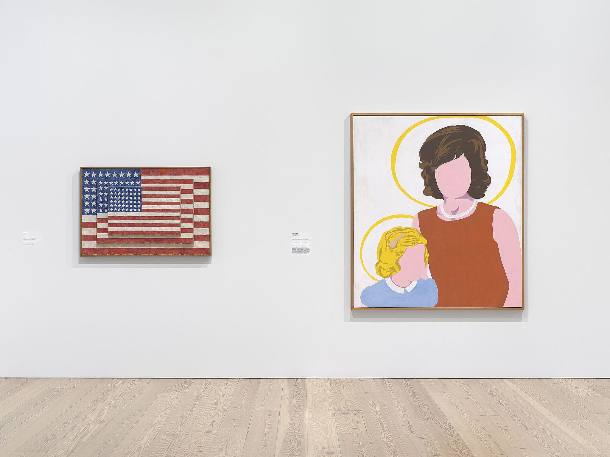 An image of the Whitney galleries with paintings on the wall